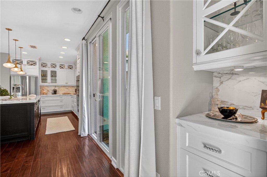 89 Dawnwood Ladera Ranch, CA 92694 - Photo 19 of 47 a view of a hallway view with wooden floor and staircase