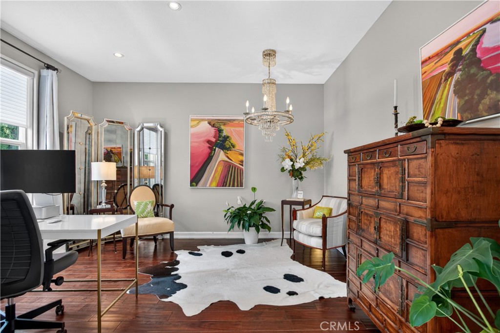 89 Dawnwood Ladera Ranch, CA 92694 - Photo 21 of 47 a living room with furniture and a chandelier