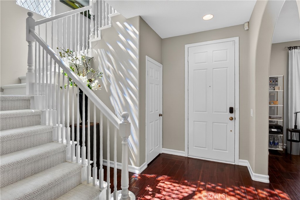 89 Dawnwood Ladera Ranch, CA 92694 - Photo 22 of 47 a view of staircase with white walls and a rug
