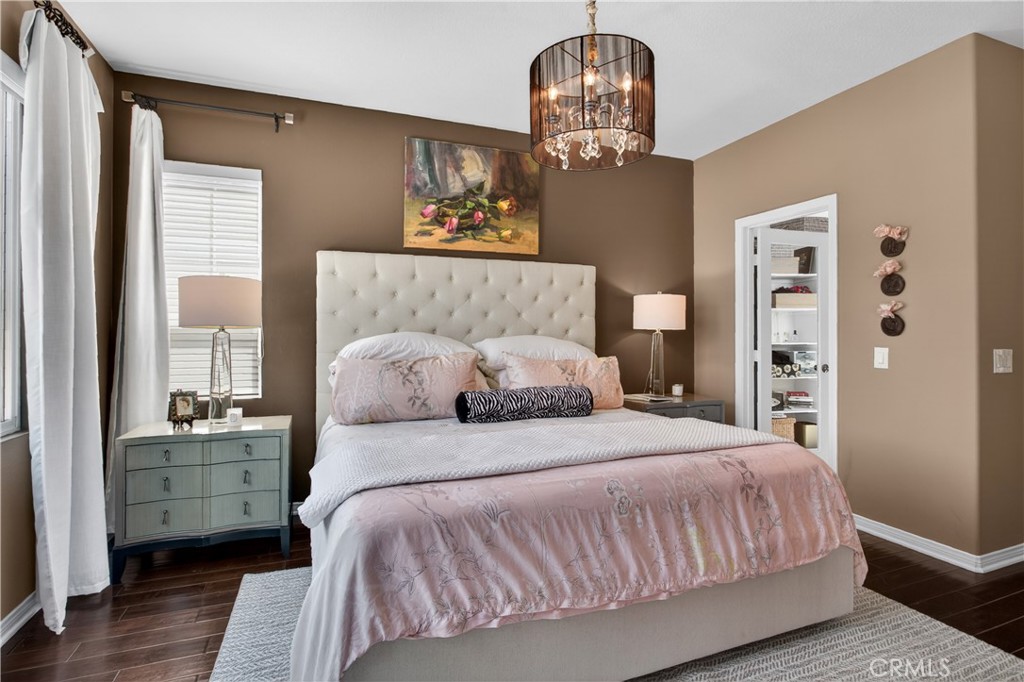89 Dawnwood Ladera Ranch, CA 92694 - Photo 24 of 47 a bedroom with bed and wooden floor