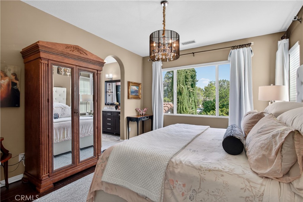 89 Dawnwood Ladera Ranch, CA 92694 - Photo 25 of 47 a bed sitting in a balcony next to a window