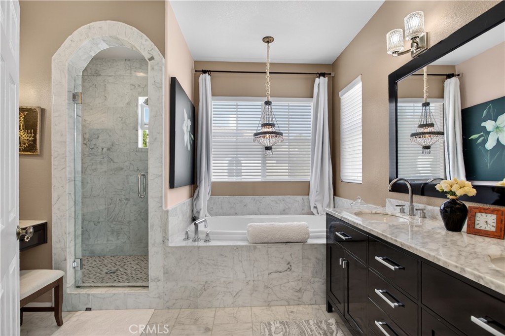 89 Dawnwood Ladera Ranch, CA 92694 - Photo 26 of 47 a bathroom with a double vanity sink mirror and shower