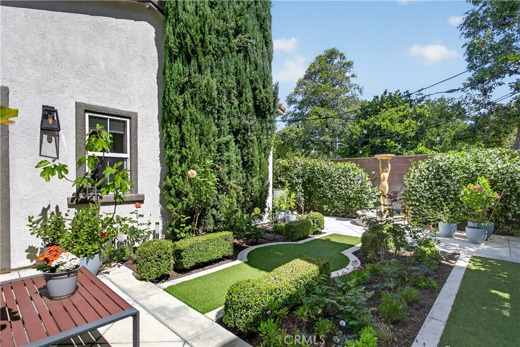 89 Dawnwood Ladera Ranch, CA 92694 - Photo 32 of 47 an aerial view of a house with a yard potted plants and large tree