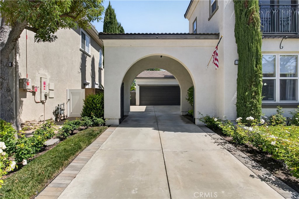 89 Dawnwood Ladera Ranch, CA 92694 - Photo 38 of 47 a front view of a house with garden