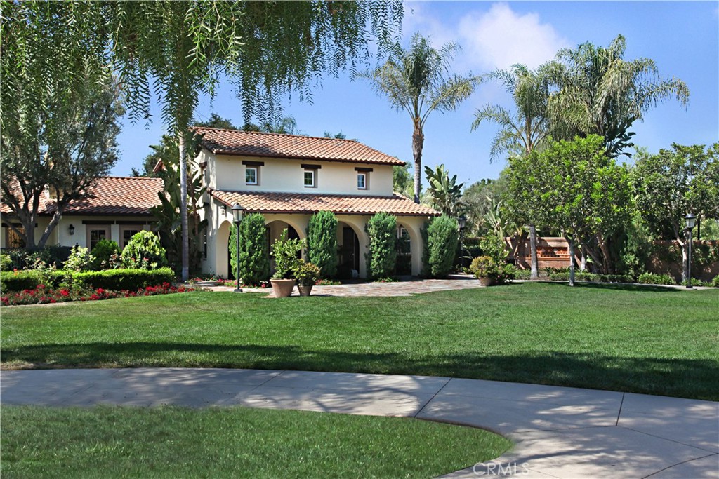 89 Dawnwood Ladera Ranch, CA 92694 - Photo 43 of 47 a front view of a house with a garden