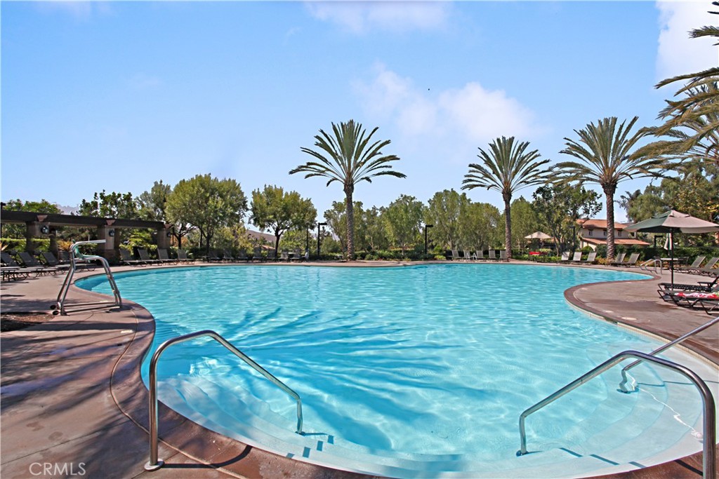 89 Dawnwood Ladera Ranch, CA 92694 - Photo 44 of 47 a view of a swimming pool and lounge chair