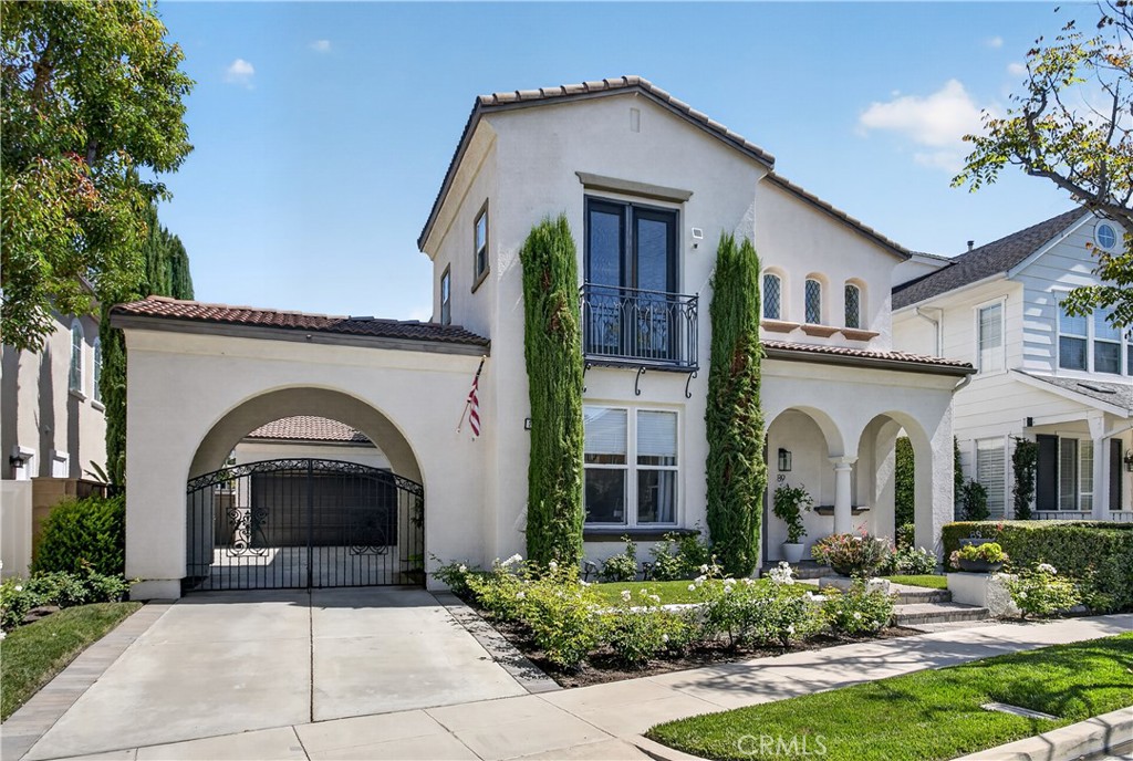 89 Dawnwood Ladera Ranch, CA 92694 - Photo 5 of 47 a front view of a house with a garden