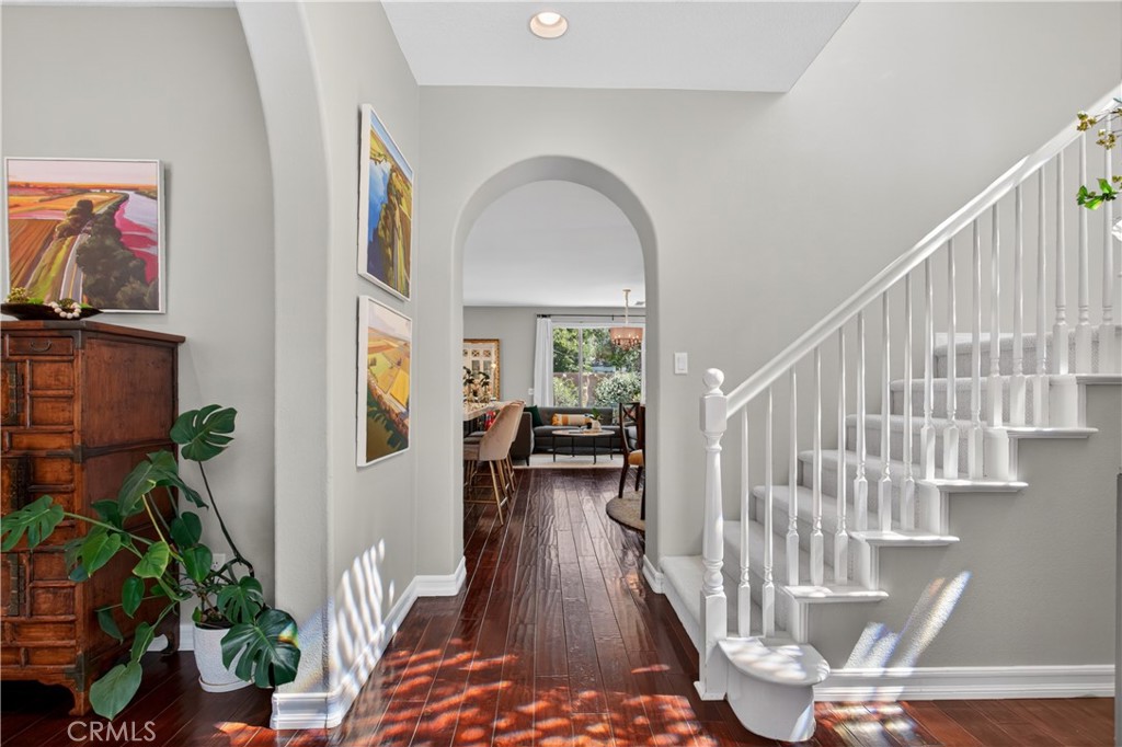 89 Dawnwood Ladera Ranch, CA 92694 - Photo 7 of 47 a view of staircase with wooden floor and a potted plant