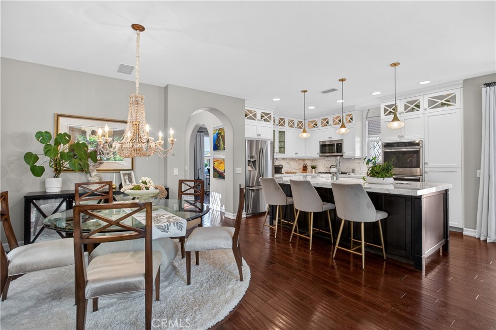 89 Dawnwood Ladera Ranch, CA 92694 - Photo 9 of 47 a view of a dining room with furniture and wooden floor
