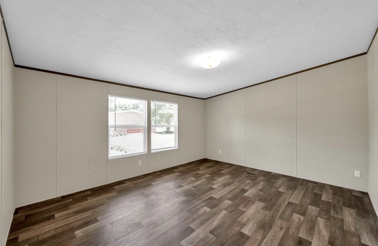 26768 B Dobbin-Huffsmith Road Magnolia, TX 77354 - Photo 12 of 21 an empty room with a window