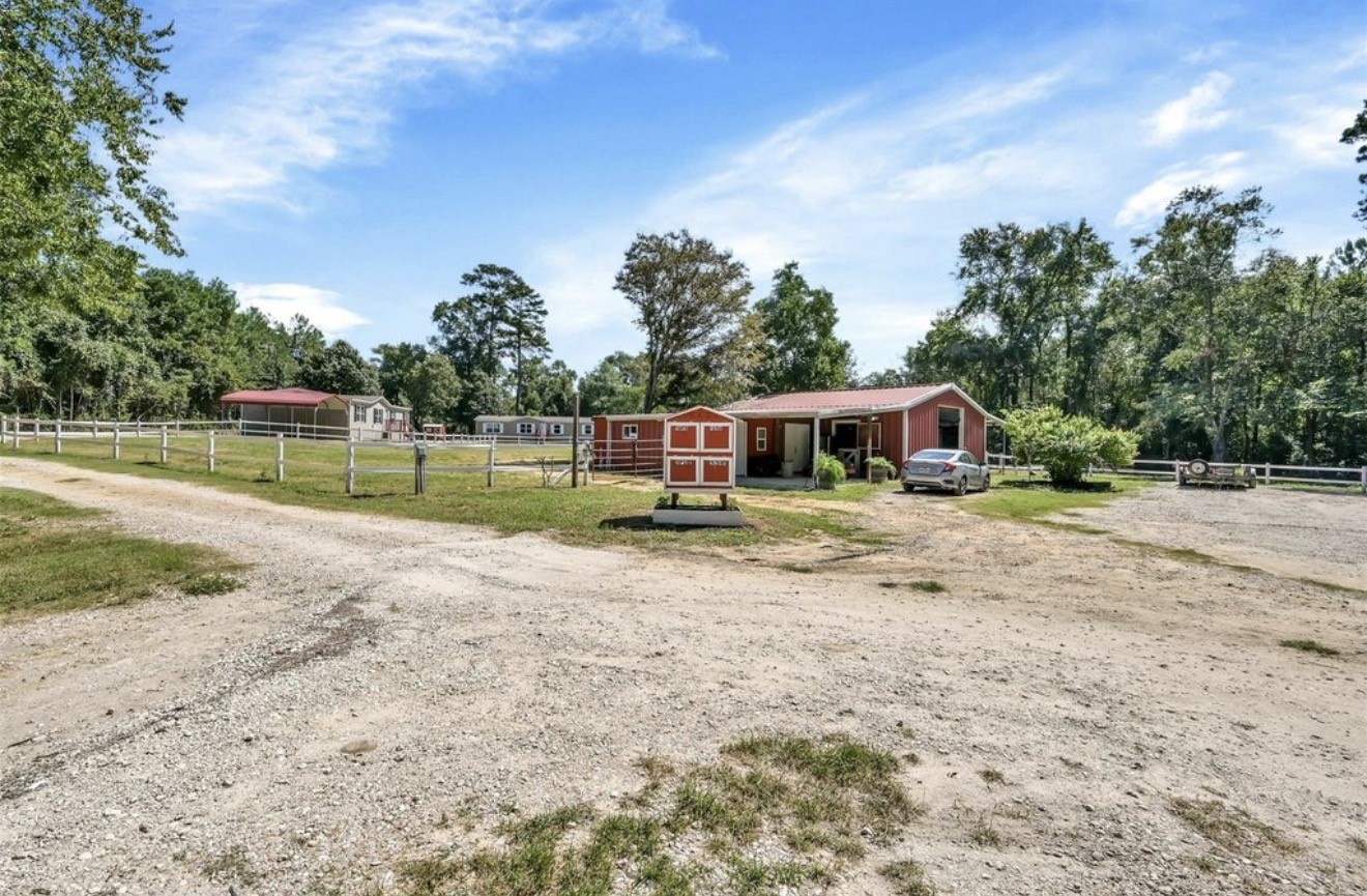 26768 B Dobbin-Huffsmith Road Magnolia, TX 77354 - Photo 6 of 21 a house view with a garden space