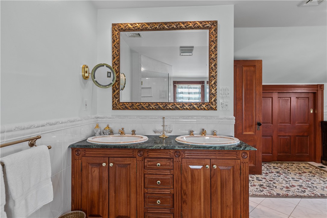 23 Clinton Street Newport, RI 02840 - Photo 28 of 45 Double vanity with marble top.