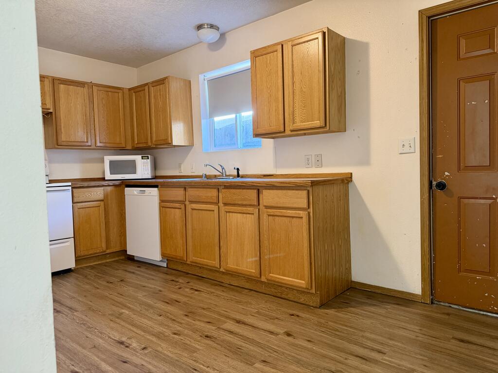 614 South Main Street Riggins, ID 83549 - Photo 46 of 70 Unit B kitchen, Unit B kitchen and door to small back patio