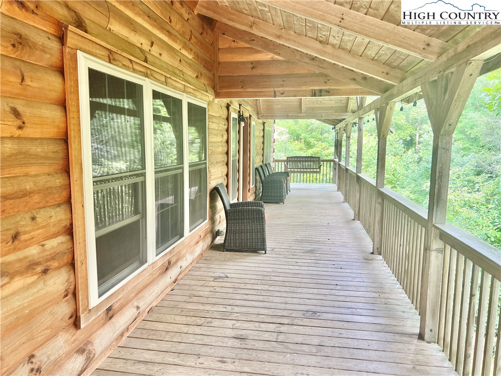 238 Harrison Lane Boone, NC 28607 - Photo 3 of 29 a building exterior with furniture