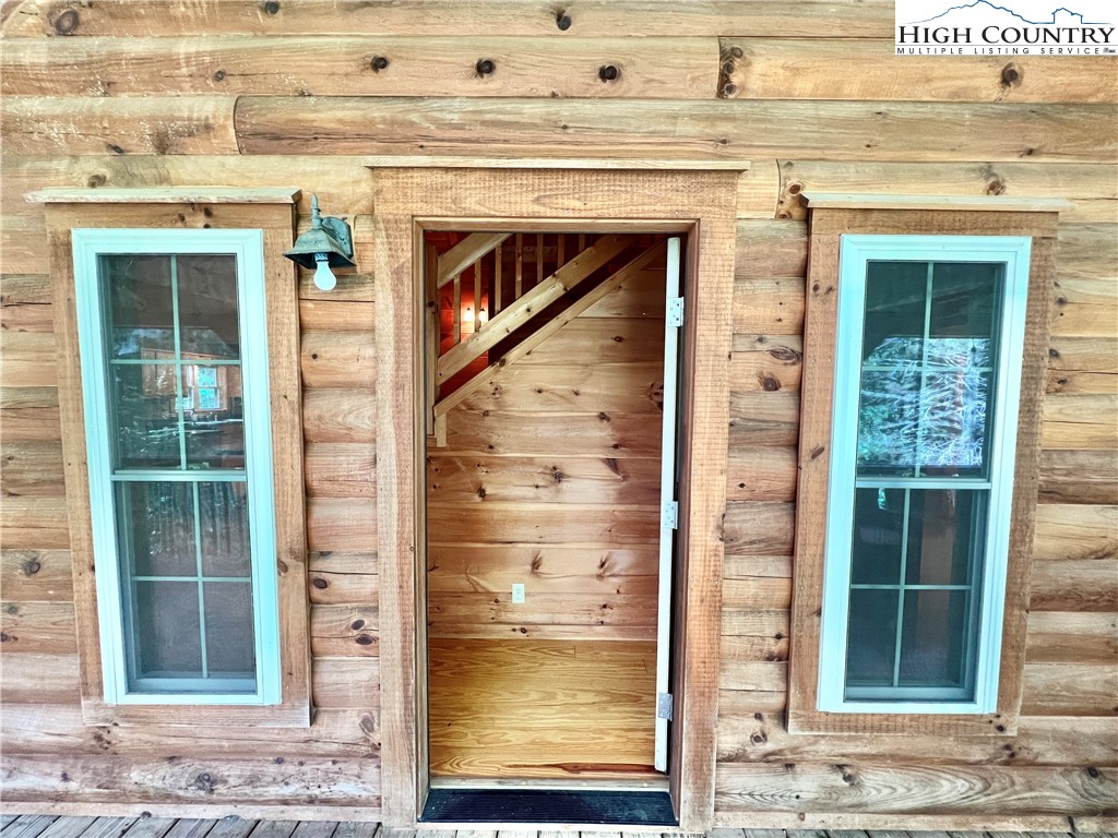 238 Harrison Lane Boone, NC 28607 - Photo 7 of 29 a view of front door of house