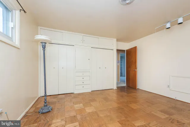 a bathroom with a sink a toilet and vanity