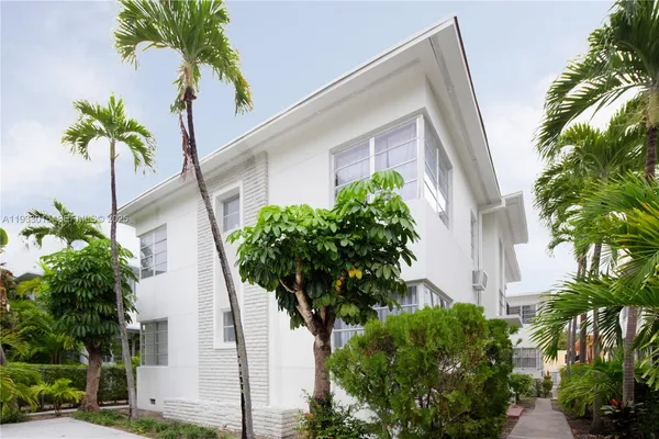 a plant that is in front of a house