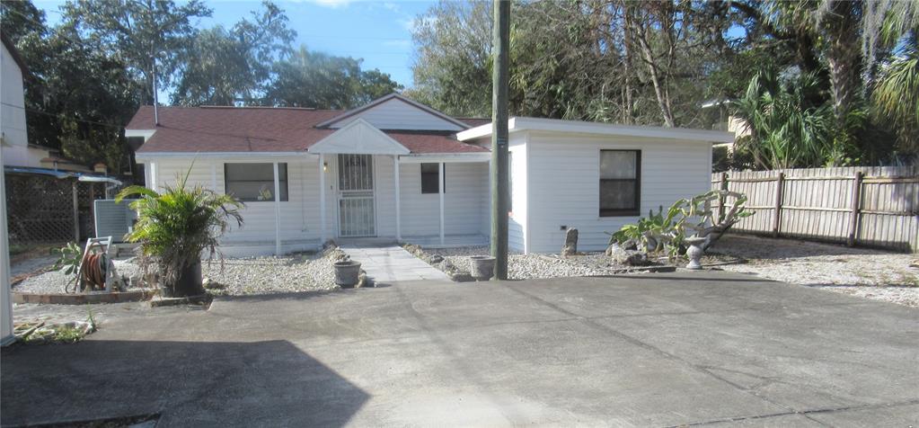 8615 Jackson Springs Road Tampa, FL 33615 - Photo 1 of 1 a view of a house with backyard