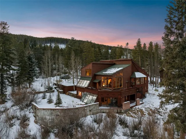 a view of a house with a table and a chairs