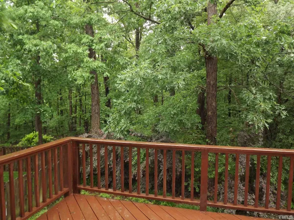 a view of a wooden roof deck