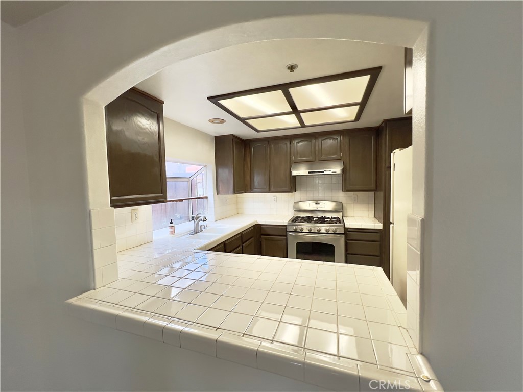 12143 Ferris Road El Monte, CA 91732 - Photo 15 of 41 a bathroom with a sink and a mirror