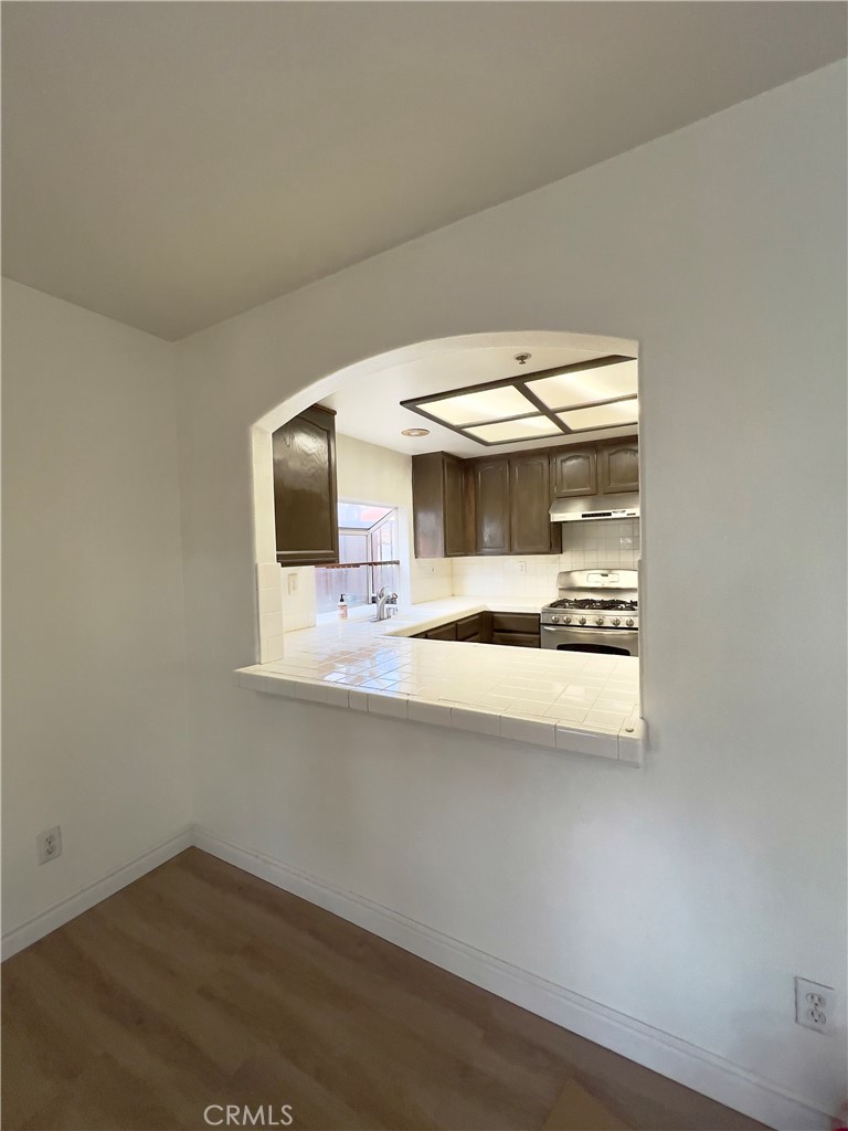 12143 Ferris Road El Monte, CA 91732 - Photo 16 of 41 a view of a hallway with a sink