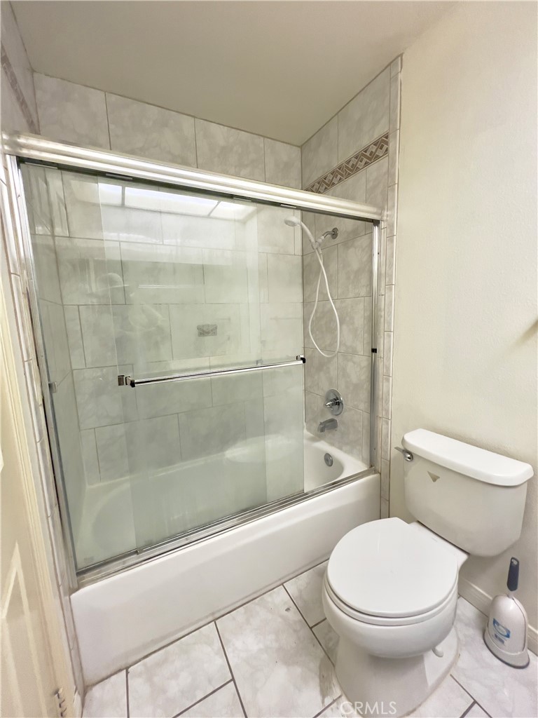 12143 Ferris Road El Monte, CA 91732 - Photo 31 of 41 a bathroom with a shower and a toilet