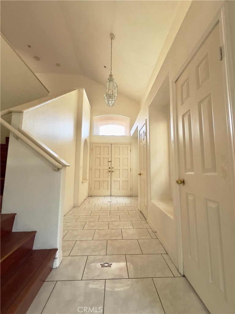 12143 Ferris Road El Monte, CA 91732 - Photo 4 of 41 a view of a hallway with windows