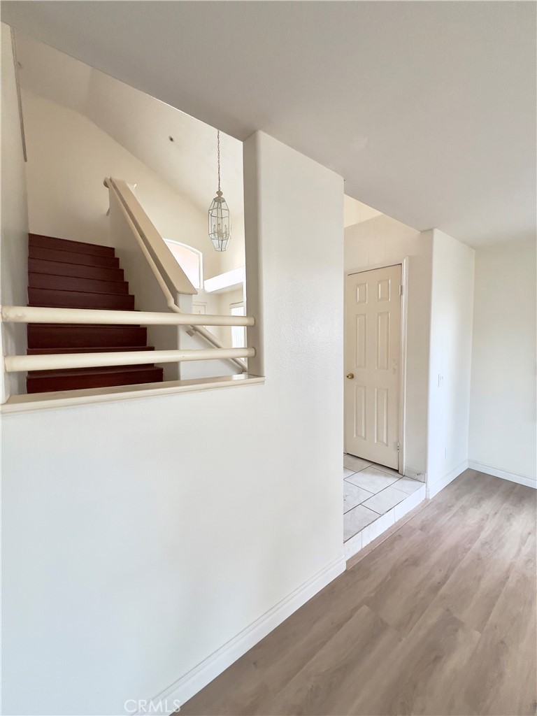 12143 Ferris Road El Monte, CA 91732 - Photo 9 of 41 a view of entryway with wooden floor
