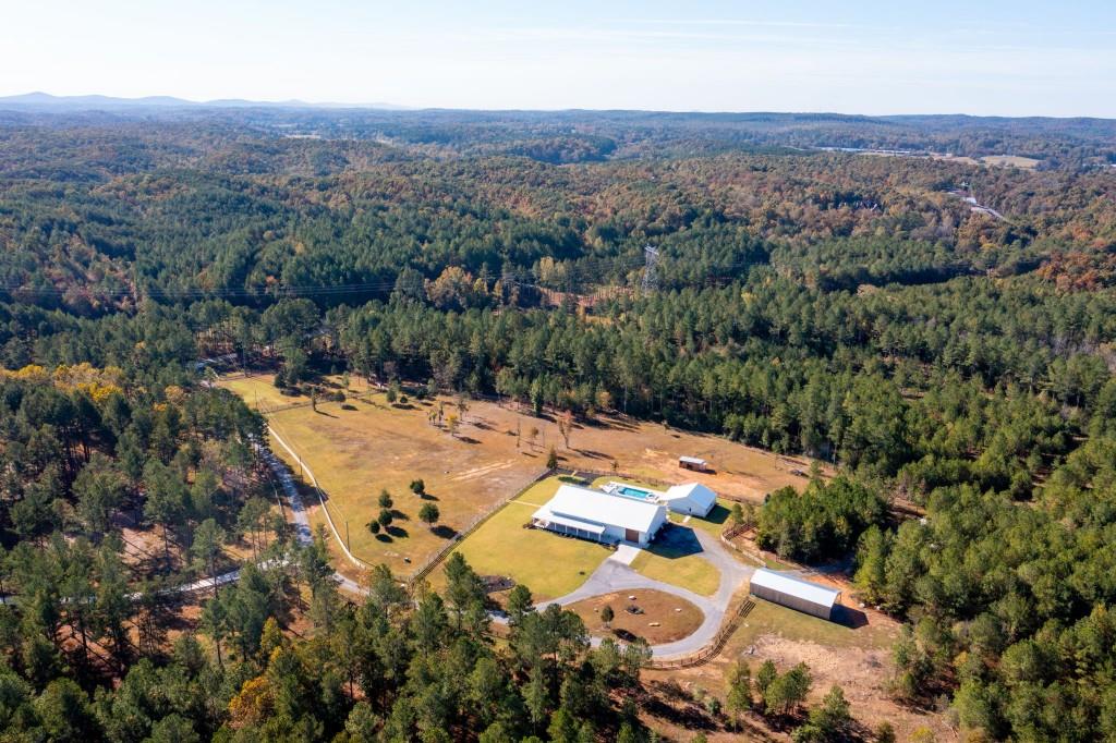 125 Perry Road Rydal, GA 30171 - Photo 123 of 139 an aerial view of a house with a yard