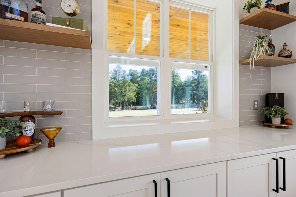 125 Perry Road Rydal, GA 30171 - Photo 18 of 139 a bathroom with a tub and a sink