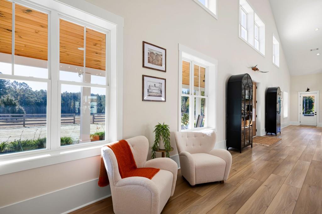 125 Perry Road Rydal, GA 30171 - Photo 19 of 139 a living room with furniture and a large window
