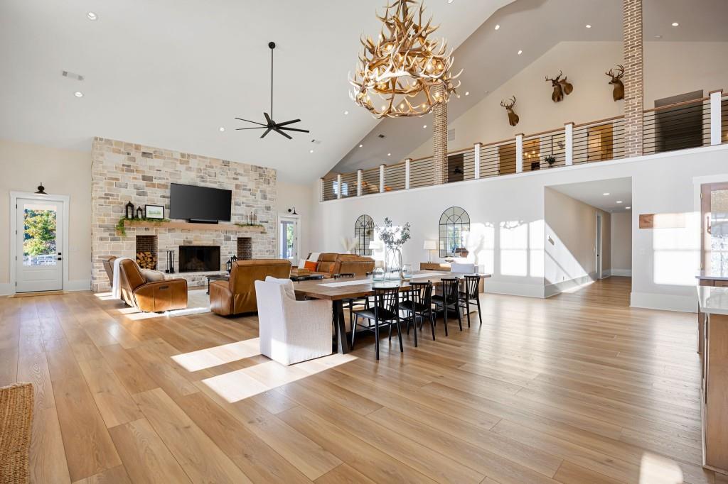 125 Perry Road Rydal, GA 30171 - Photo 29 of 139 a living room with furniture a fireplace and a flat screen tv