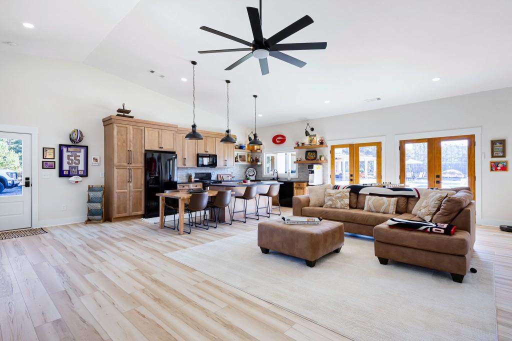 125 Perry Road Rydal, GA 30171 - Photo 93 of 139 a living room with furniture and a flat screen tv