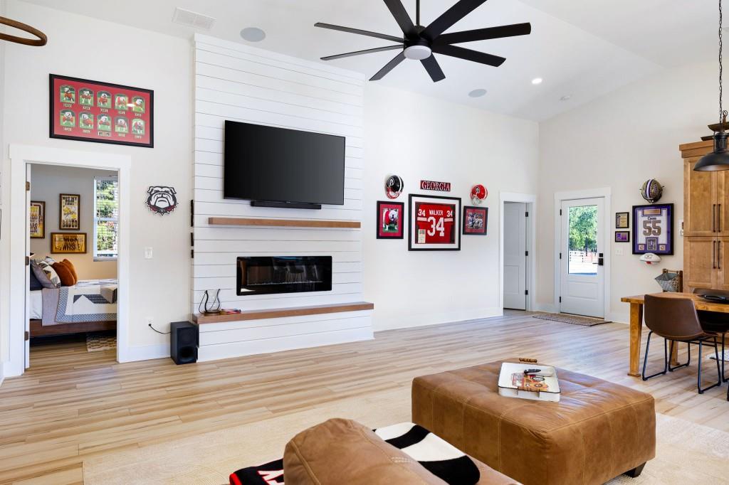 125 Perry Road Rydal, GA 30171 - Photo 96 of 139 a living room with furniture and a flat screen tv