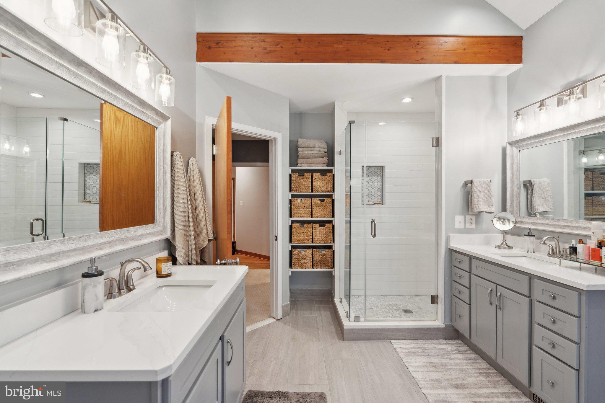7514 A Evans Ford Road Clifton, VA 20124 - Photo 26 of 50 a bathroom with a double vanity sink mirror and double