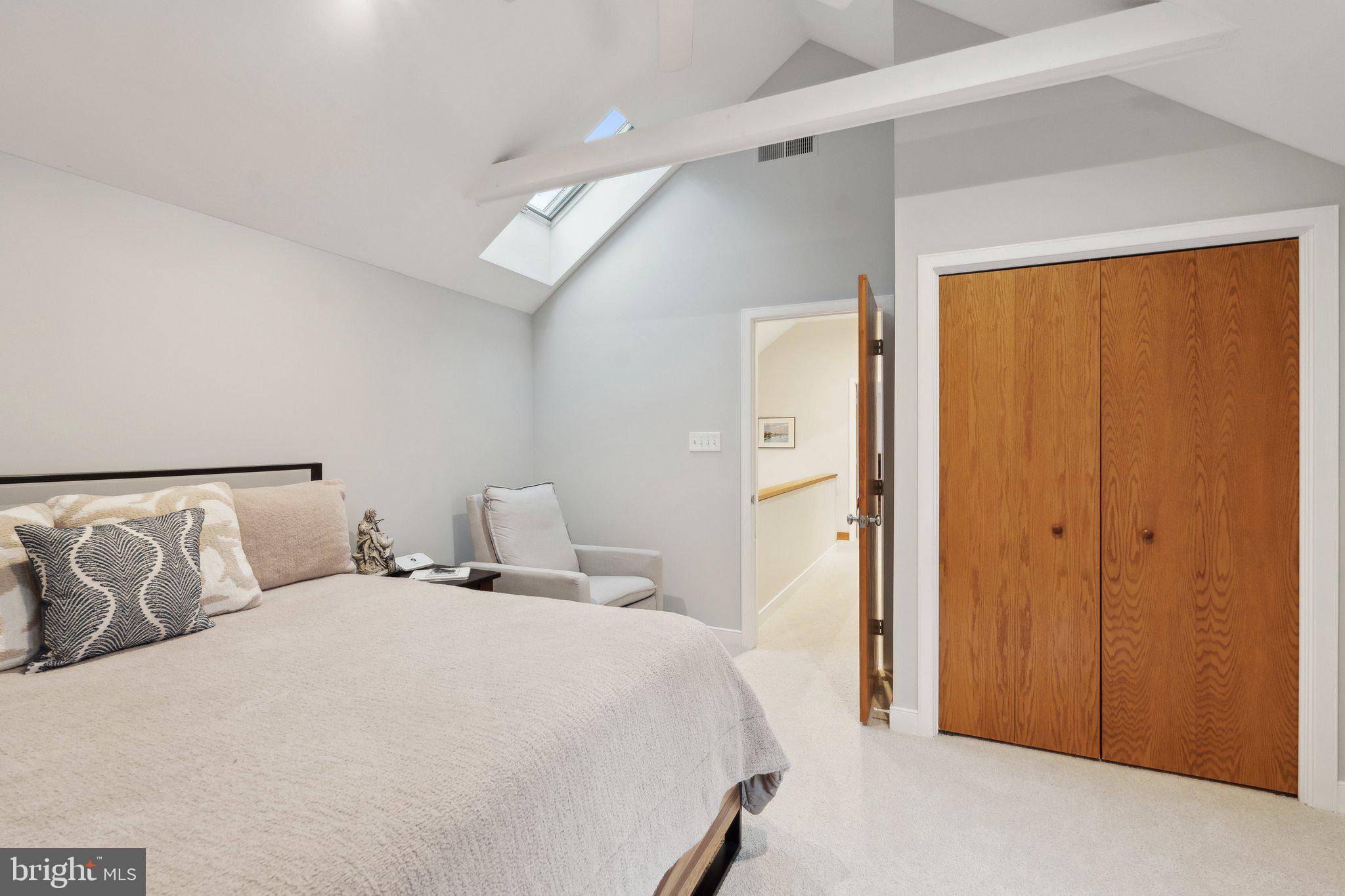 7514 A Evans Ford Road Clifton, VA 20124 - Photo 37 of 50 a bedroom with a large bed and a closet