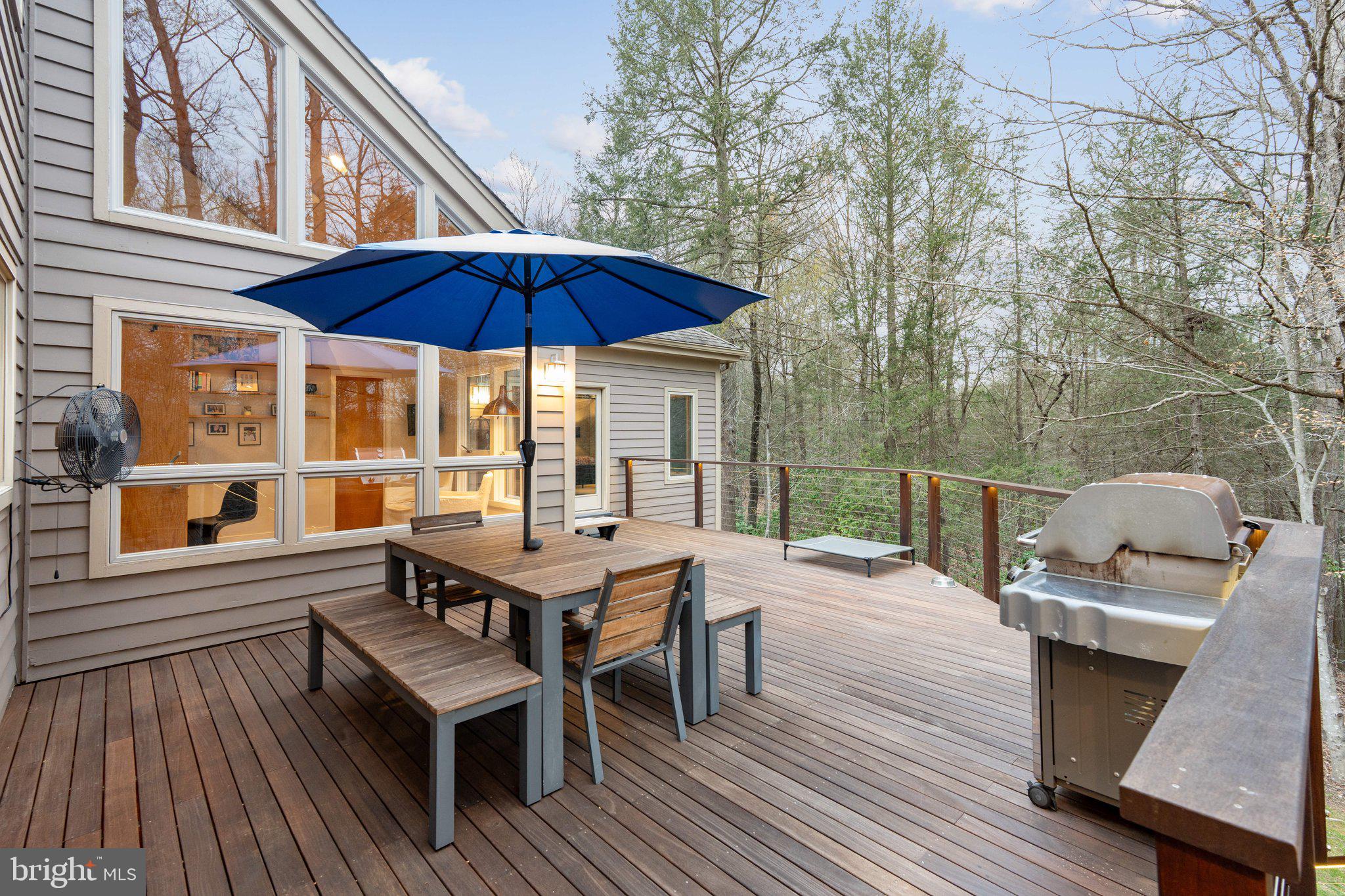7514 A Evans Ford Road Clifton, VA 20124 - Photo 46 of 50 a view of a roof deck with table and chairs