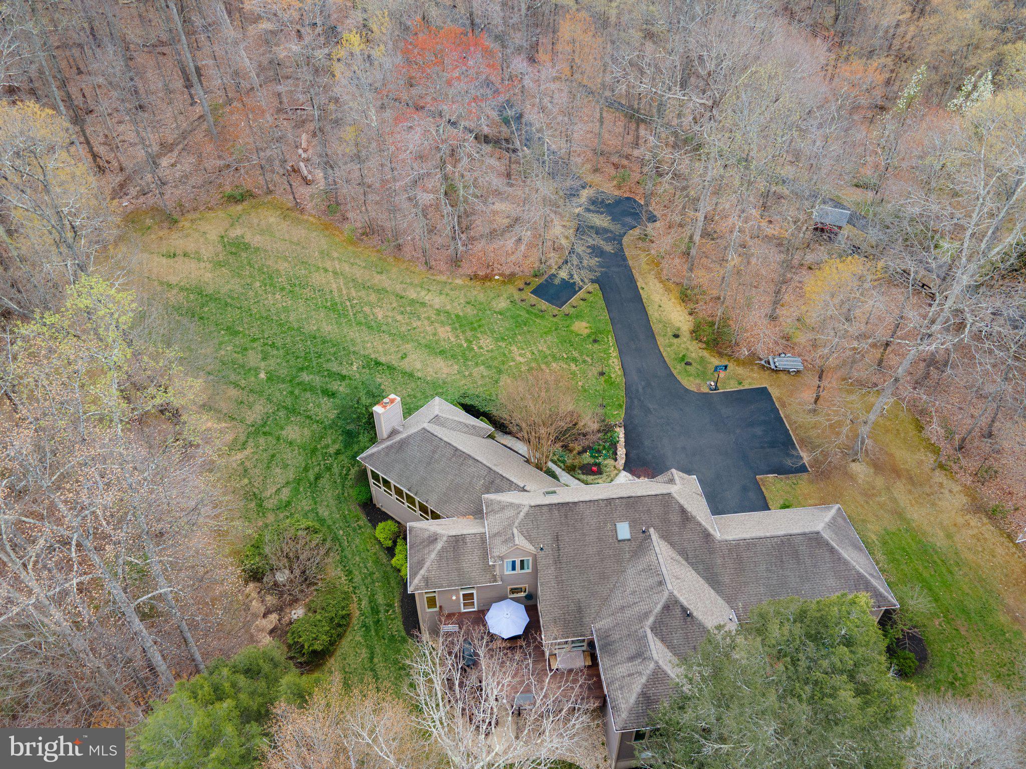7514 A Evans Ford Road Clifton, VA 20124 - Photo 49 of 50 front view of a house with a yard