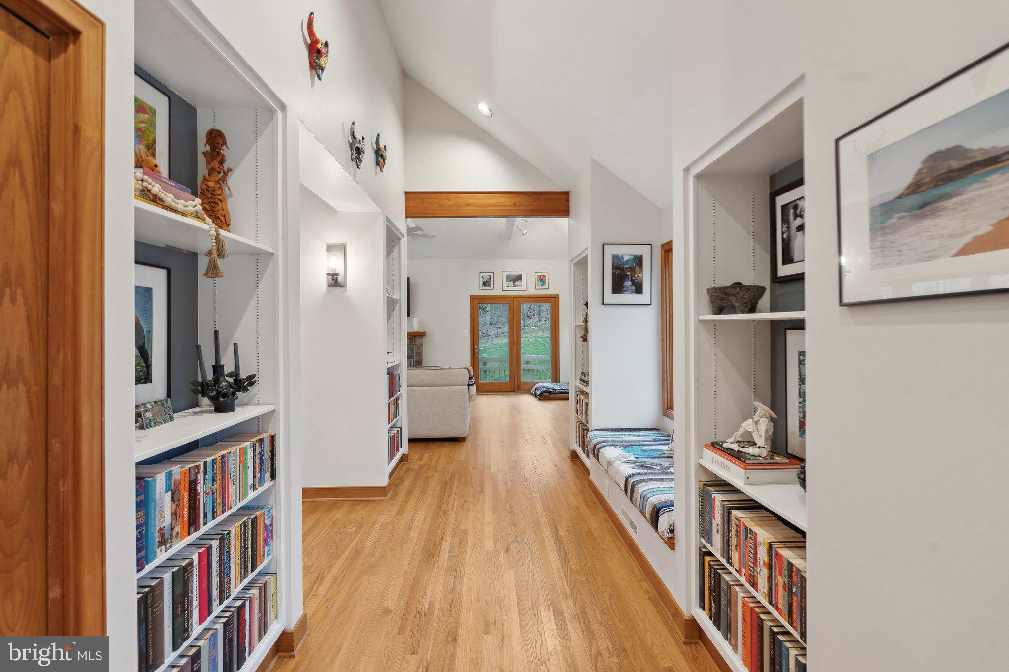 7514 A Evans Ford Road Clifton, VA 20124 - Photo 10 of 50 a view of a hallway with wooden floor and windows