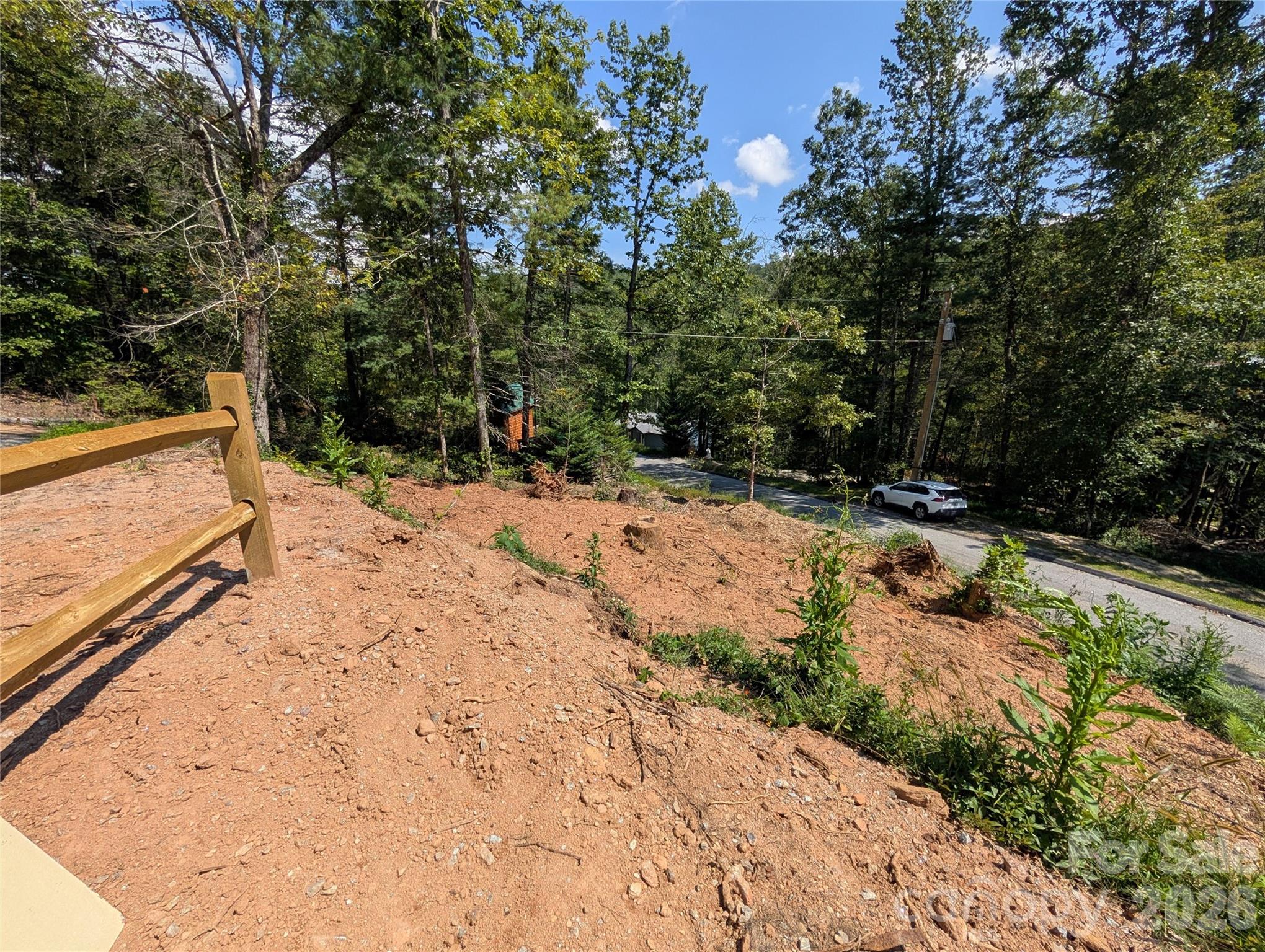 260 Oak Ridge Road Hendersonville, NC 28792 - Photo 3 of 24 a view of an outdoor space with yard