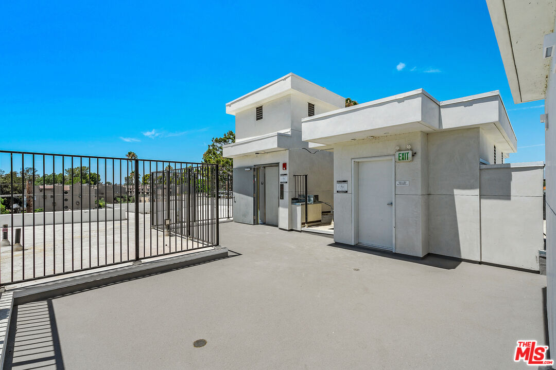 4406 Fulton Avenue, Unit 404 Sherman Oaks, CA 91423 - Photo 22 of 30 a view of a house with a balcony