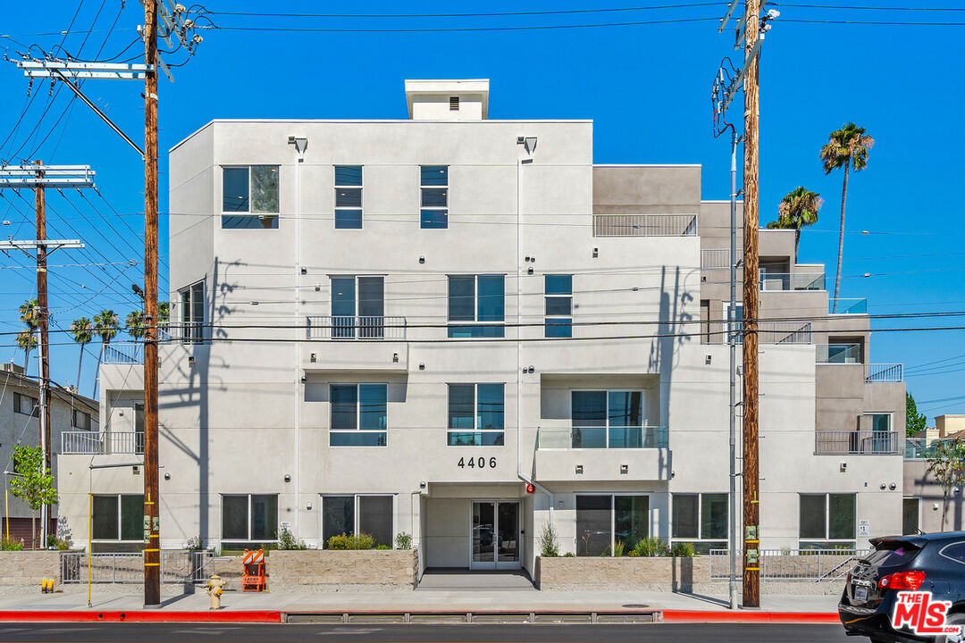 4406 Fulton Avenue, Unit 404 Sherman Oaks, CA 91423 - Photo 29 of 30 a front view of a building with street view