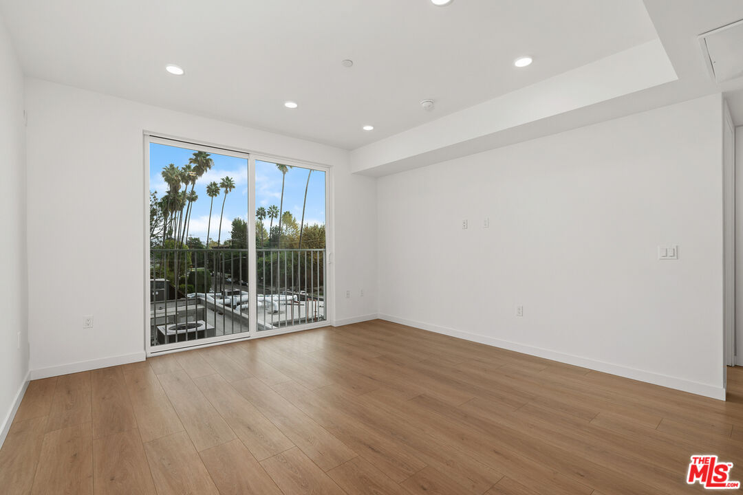 4406 Fulton Avenue, Unit 404 Sherman Oaks, CA 91423 - Photo 8 of 30 a view of workspace with wooden floor