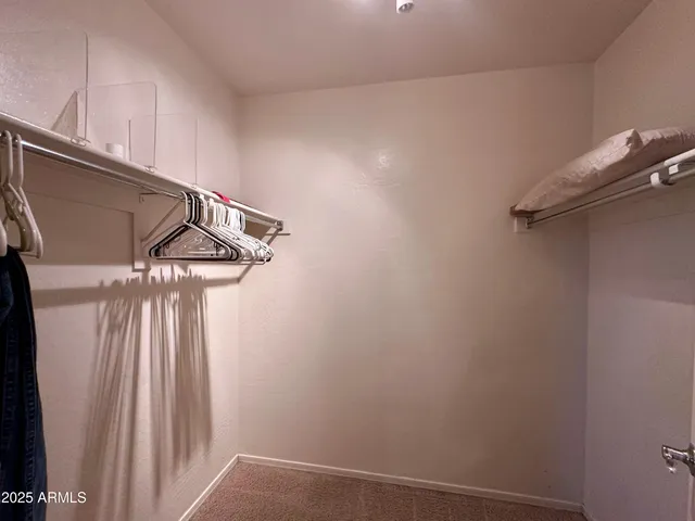 a view of small space with racks on the wall