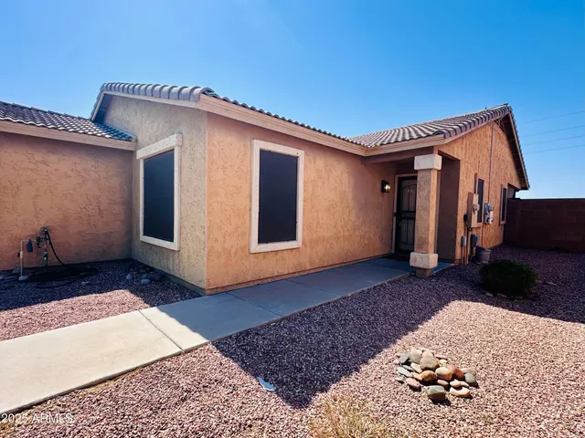 a house view with a backyard