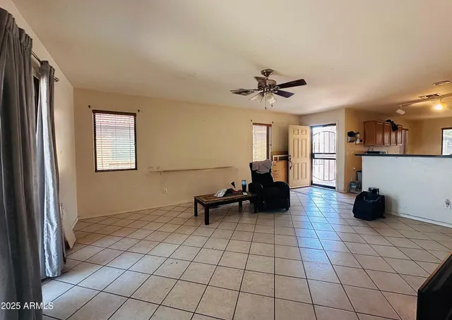 a living room with furniture and a table