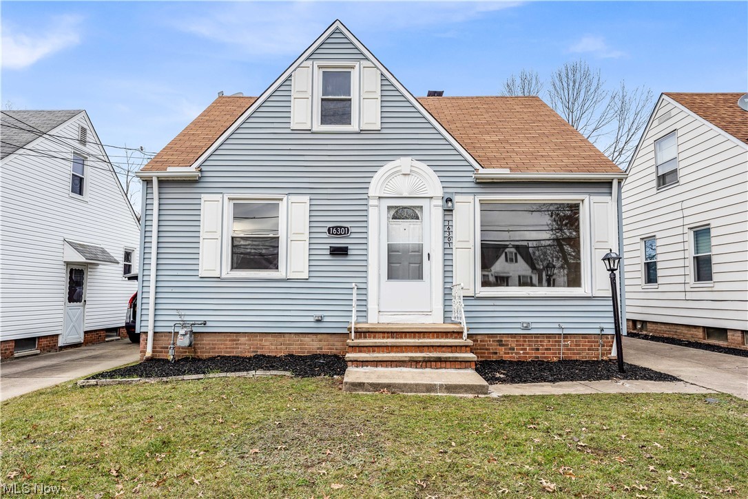 View of front of home with a front yard