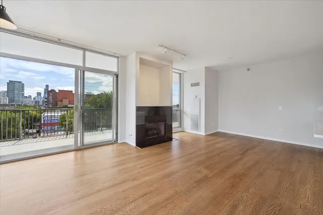 a view of livingroom with furniture and floor to ceiling window