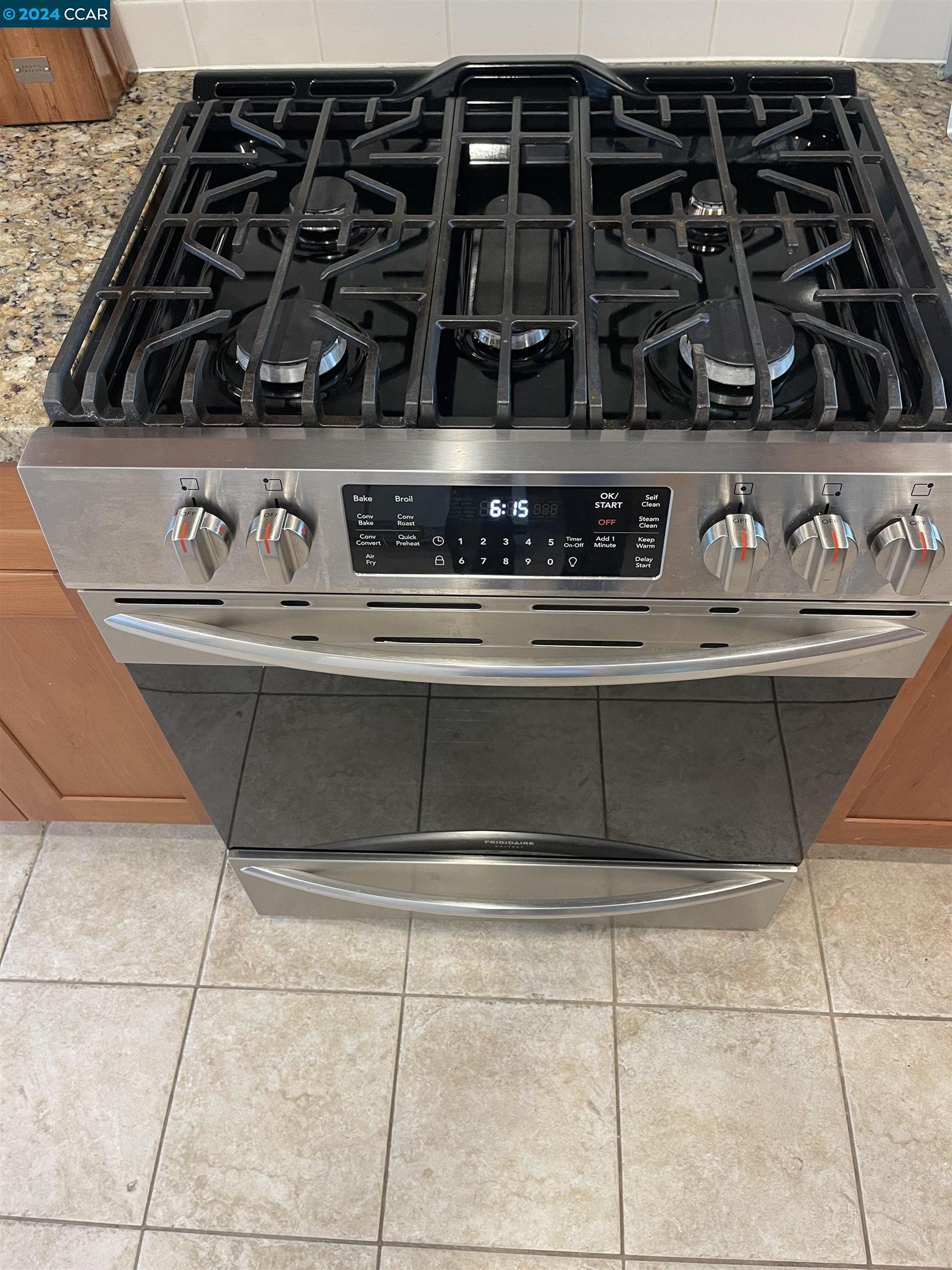1900 St George Road Danville, CA 94526 - Photo 8 of 12 a close view of a stove top oven